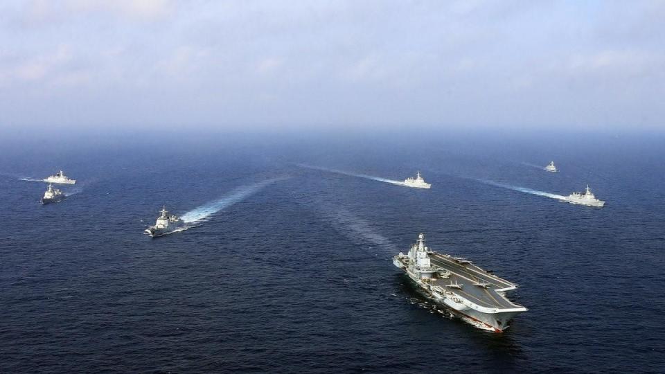 辽宁舰服役于中国海军战区的战略地位与影响，辽宁舰在中国海军战区的战略地位及其影响