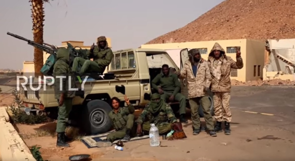 利比亚最后的部队32旅,历史与现代的交织,利比亚部队32旅,历史与现代的交织